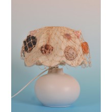 The lamp with the fishnet of shells